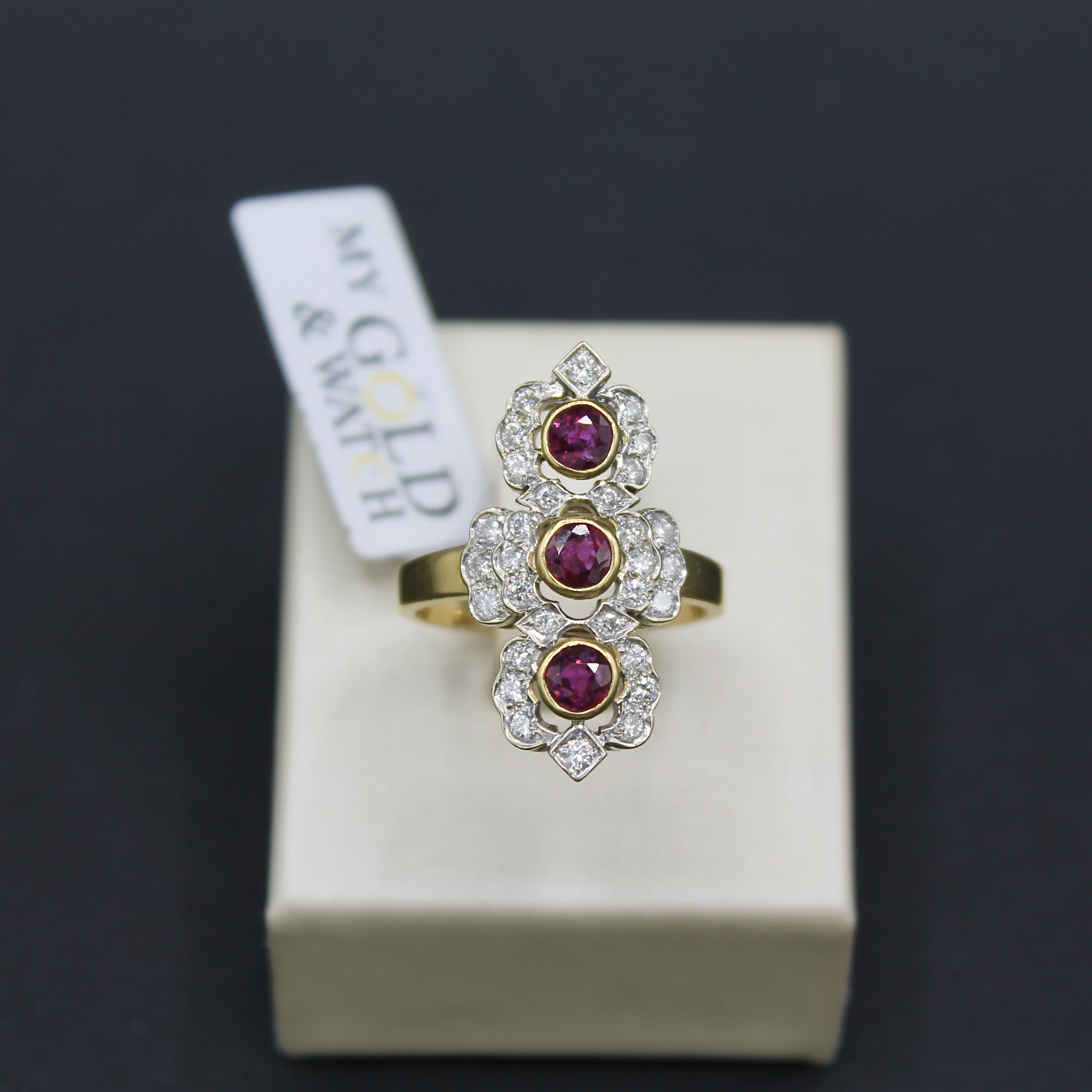 Anello oro giallo 18k con diamanti e rubini