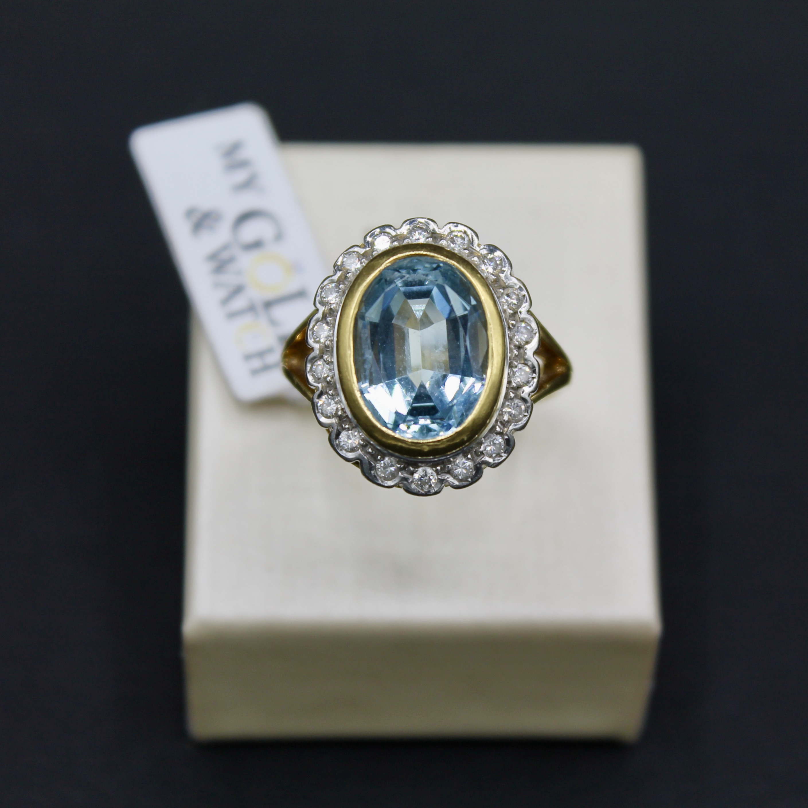 Anello oro giallo 18k con acquamarina e diamanti