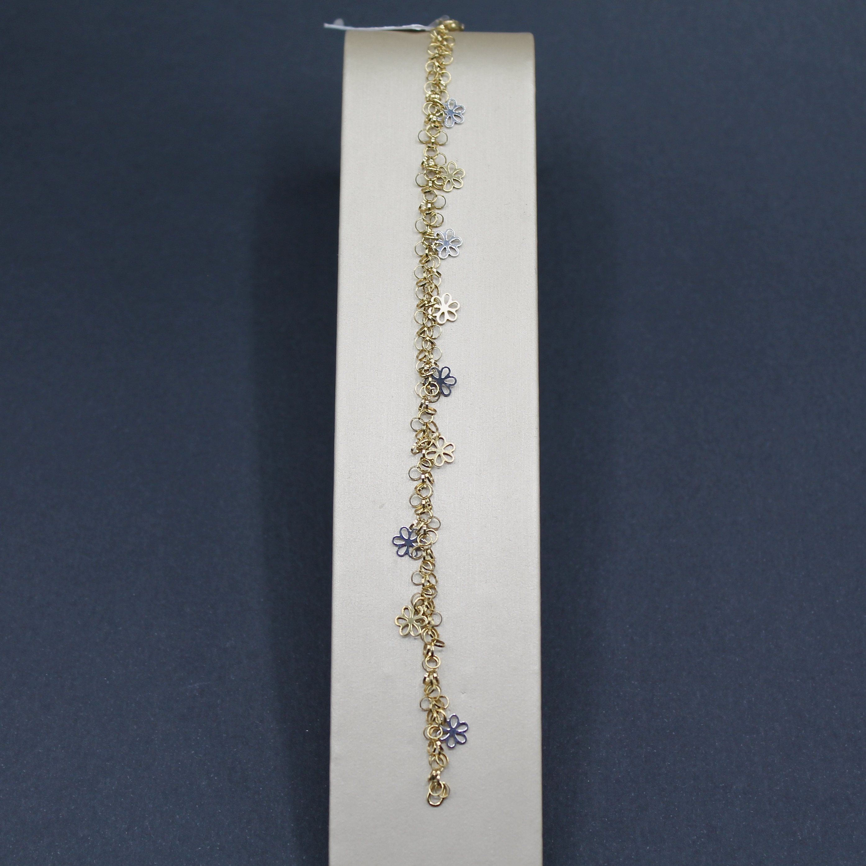 bracciale con fiorellini oro giallo e bianco 18k